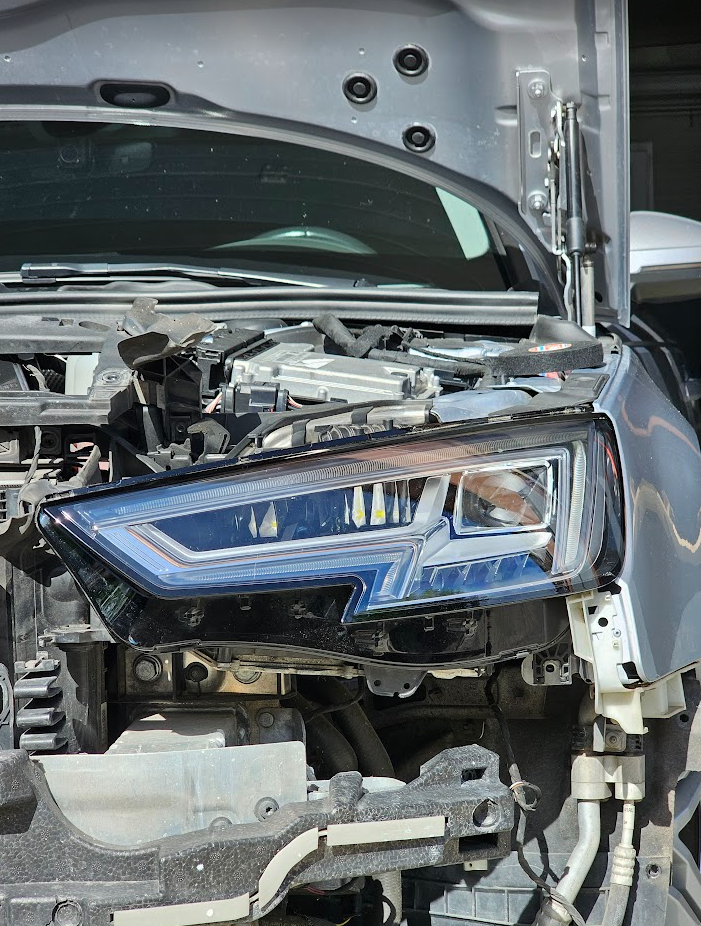 Full LED headlight fitted on the Audi A4 B9 with the front bumper removed