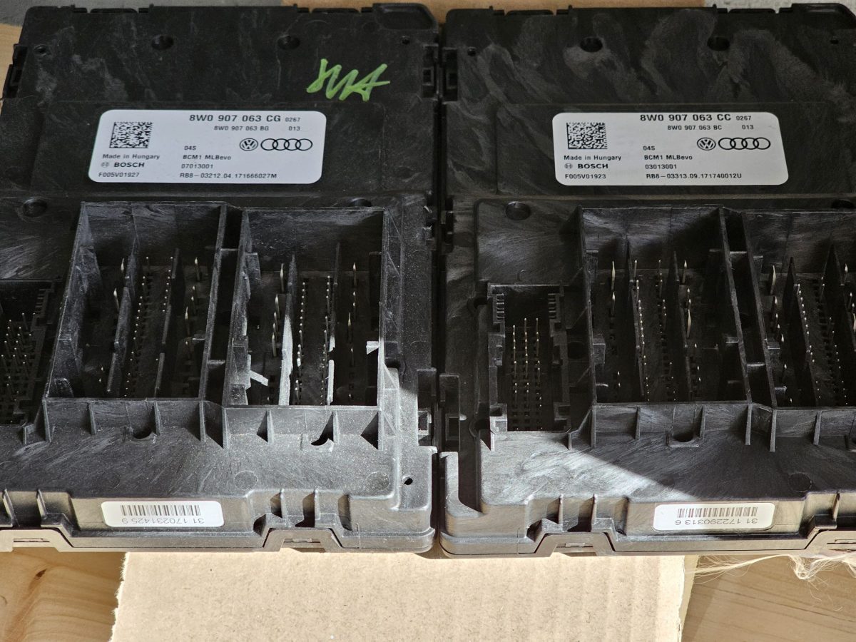 Bosch BCM1 MLBevo modules side by side: new Highline 8W0 907 063 CG on the left and original 8W0 907 063 CC on the right